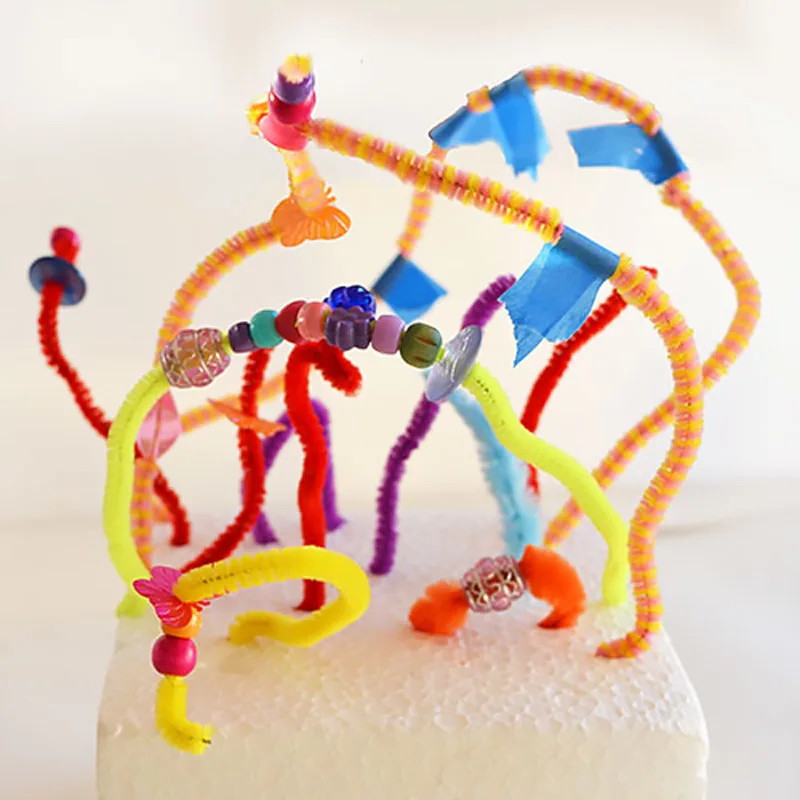 Pipe cleaners are perfect for unleashing creativity! Encourage your kids to build abstract imaginative structures using pipe cleaners, beads, and other crafty items to stimulate their fine motor skills and creativity.
