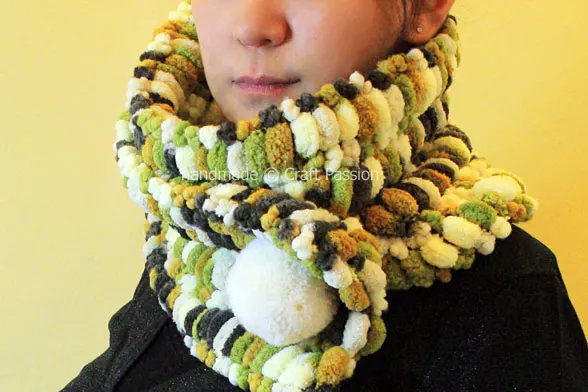 Learn how to knit a scarf that's super soft and warm with Pom Pom yarn. It is a quick project and you only need to know how to do the knit stitch.