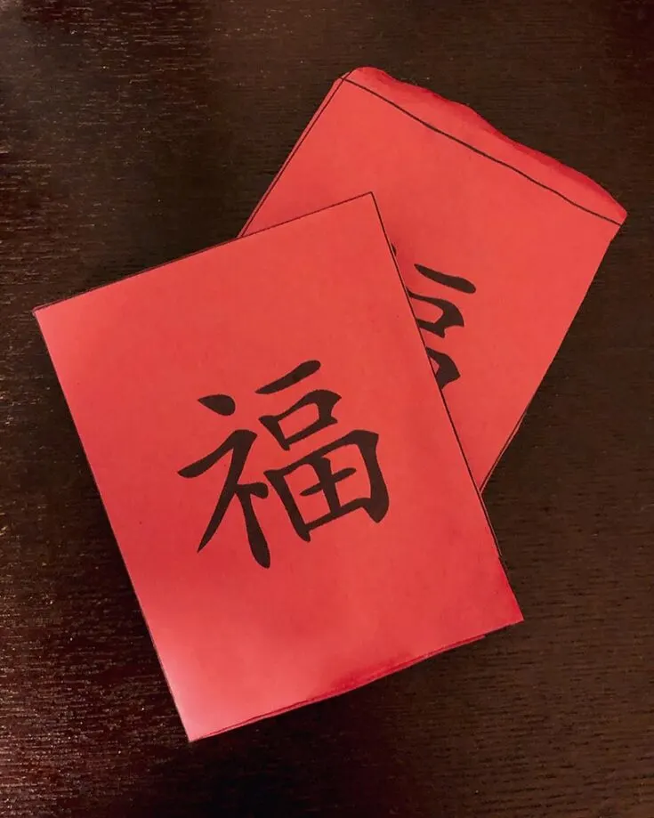 In a hurry? Here&rsquo;s a quick and easy way to make red envelopes! All you need is red paper, a printer for the template, a glue stick, and scissors. Don&rsquo;t forget to slip in some small notes to share good luck and prosperity with the receivers!