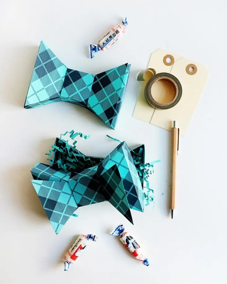 Check out this amazing Father&rsquo;s Day bowtie box that can be used to store his gift on the inside. Simply construct the gift by using some blue textweight paper, crafting supplies, and the box template. On the contrary, you can also add a handwritten card for your Dad to read before opening his present.&nbsp;