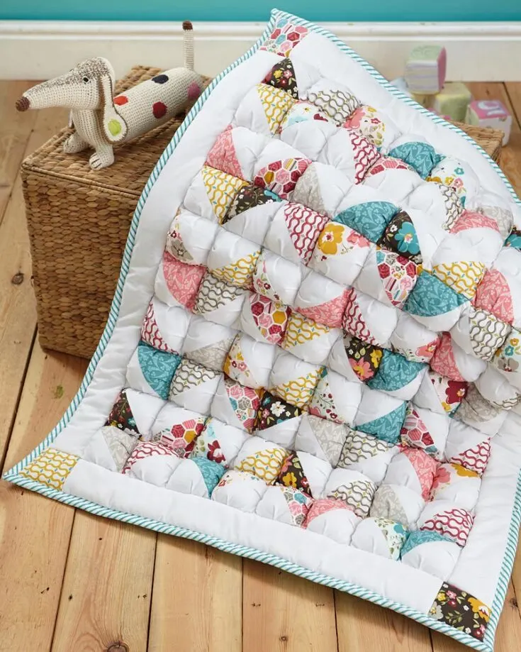 Get ready to experience the delightful world of soft puff quilts! It&rsquo;s so fluffy and light as air, making it the perfect marshmallow quilt to wrap your little ones in. Although this pattern might require extra time and attention to detail, it&rsquo;s so rewarding, and your kids will love it! The finished size is 36&rdquo; x 31&rdquo;.