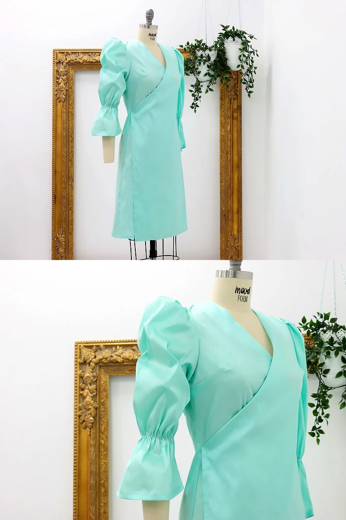 This puffed 3/4 sleeve wrap dress is a dashing garment to add to your closet. You'll look dressed to the nines for your next business meeting! Make sure to get a snap or hook and eye closure for the front panel of the dress.