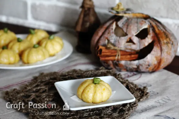 Pumpkin Steamed Buns: Chinese mantou buns shaped like pumpkins, infused with cinnamon and pumpkin flavors for fall.