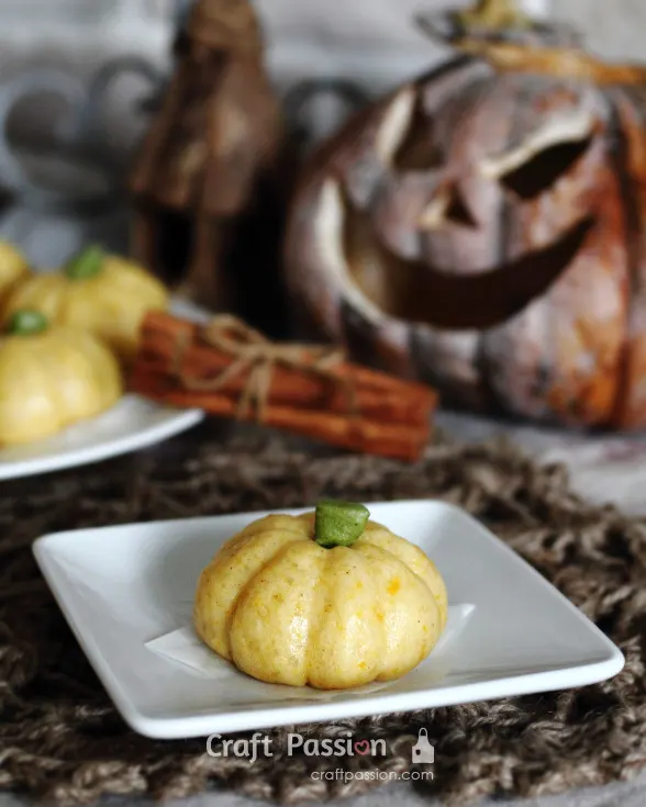 Pumpkin Steamed Buns: Chinese mantou buns shaped like pumpkins, infused with cinnamon and pumpkin flavors for fall.