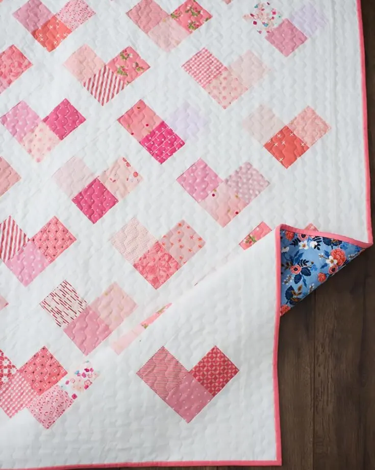 Say hello to the Quilty Hearts quilt! It&rsquo;s a fun, modern, and simple design that is inexpensive. Not to mention, it&rsquo;s fat-eighths, fat-quarter, and scrap-friendly. This beginner pattern also comes in 5 sizes.