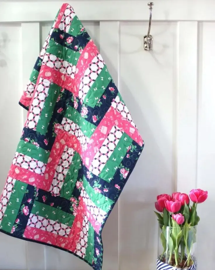 Choo Choo! Quilt this beautiful and seamless quick Rail Fence baby quilt for your little one today! It is effortless to make and uses strip-piecing shortcuts to make quilting faster. The finished size is 40&rdquo; x 40&rdquo;.