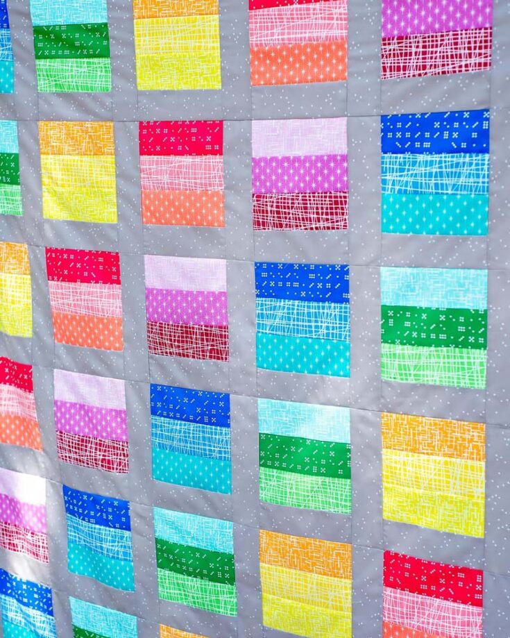 Here&rsquo;s an adorable pattern you can piece together quickly because it&rsquo;s a fast sewing project! The Rainbow Blocks Quilt is made with jelly roll strips and is oh-so-simple! It&rsquo;s also great for stash-busting, as the fabric prints do not have to be color-coordinated, so you can go ham with the construction while using this blog&rsquo;s simple piecing techniques. This pattern offers four sizes as follows: Crib (35&rdquo; x 43&rdquo;) Throw (51&rdquo; x 59&rdquo;) Twin (67&rdquo; x 91&rdquo;) Full (79&rdquo; x 95&rdquo;)