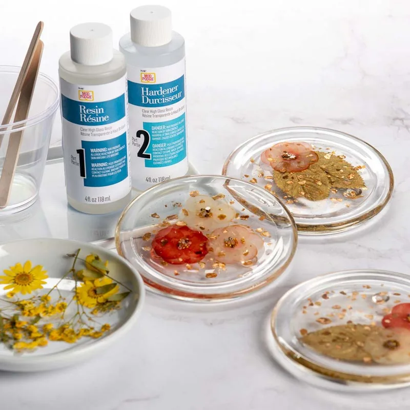 Check out this article that teaches you to preserve and incorporate flowers into resin! You can make them into pretty jewelry, coasters, house decor, and more.
