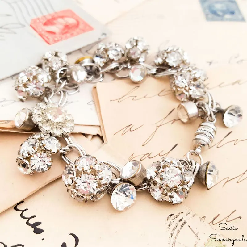 Looking for something shiny to add to your jewelry collection? Have a look at this rhinestone charm bracelet crafted with vintage rhinestone buttons. This bracelet will elevate and add glamor to your outfit for a night out.
