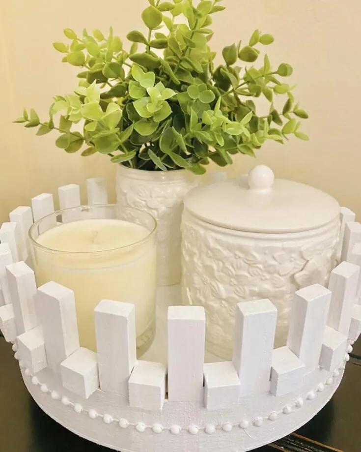 Decorative trays aren&rsquo;t just perfect for decor, they are also great at keeping spaces tidy, reducing clutter in your home. You don&rsquo;t have to be a woodworking expert to create dollar tree crafts like this round wood tray with Jenga blocks. All you need is to run down to the dollar store for some supplies and follow this simple step-by-step guide.
