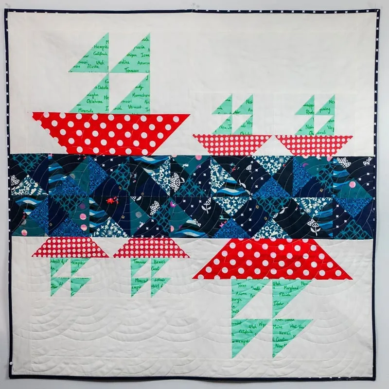 Have a look at this adorable modern baby quilt that features cute sailboat blocks with a gorgeous ocean background for your little ones who love the sea! It's a fat-quarter-friendly pattern, and it incorporates quarter-square triangles and half-square triangles, as well. Try it out now!