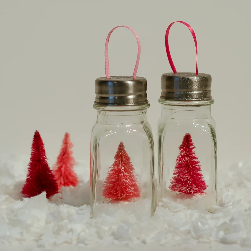 Did someone say salt shaker? If you have empty salt/pepper shaker bottles don't throw them out! You can repurpose them into ornaments that are so adorable! Just be careful not to drop them!