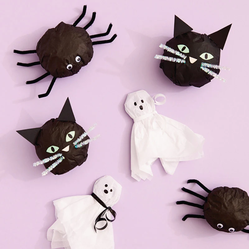 Who says ghosts, spiders, and cats have to be scary? These super cute Halloween treat bags, made with tissue paper and easy supplies, turn spooky into sweet! Hand them out at a classroom party, trick-or-treat, or as party favors packed with candies!