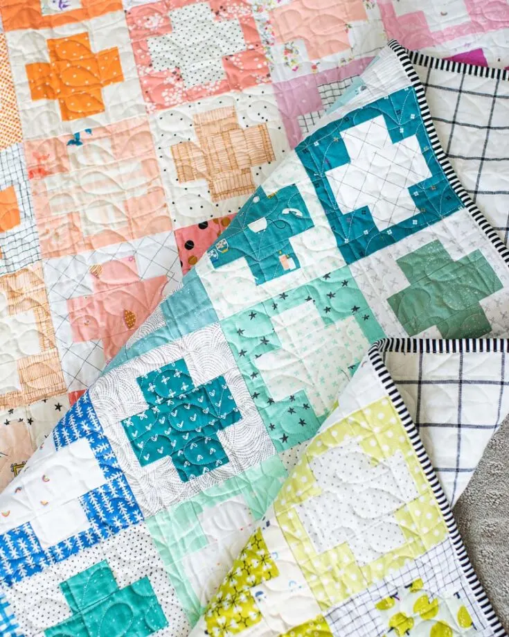 Check out this excellent rainbow-inspired scrap design that is to die for! It's a coordinated scrap design that uses 2.5" strips or small scrap fabric from your stash, which results in a modern scrappy plus quilt design. It's also a beginner pattern with size instructions ranging from baby to king.&nbsp;