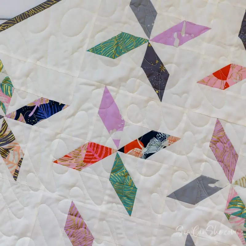 Next up is this beautiful and minimalistic quilt design made from a mixture of small fabric scraps! It&rsquo;s fast and easy to sew, and you&rsquo;ll get the option to learn two different methods of making HST blocks. Learn how to make this gorgeous 34 &frac12;&rdquo; x 46&rdquo; quilt piece by clicking the link below!