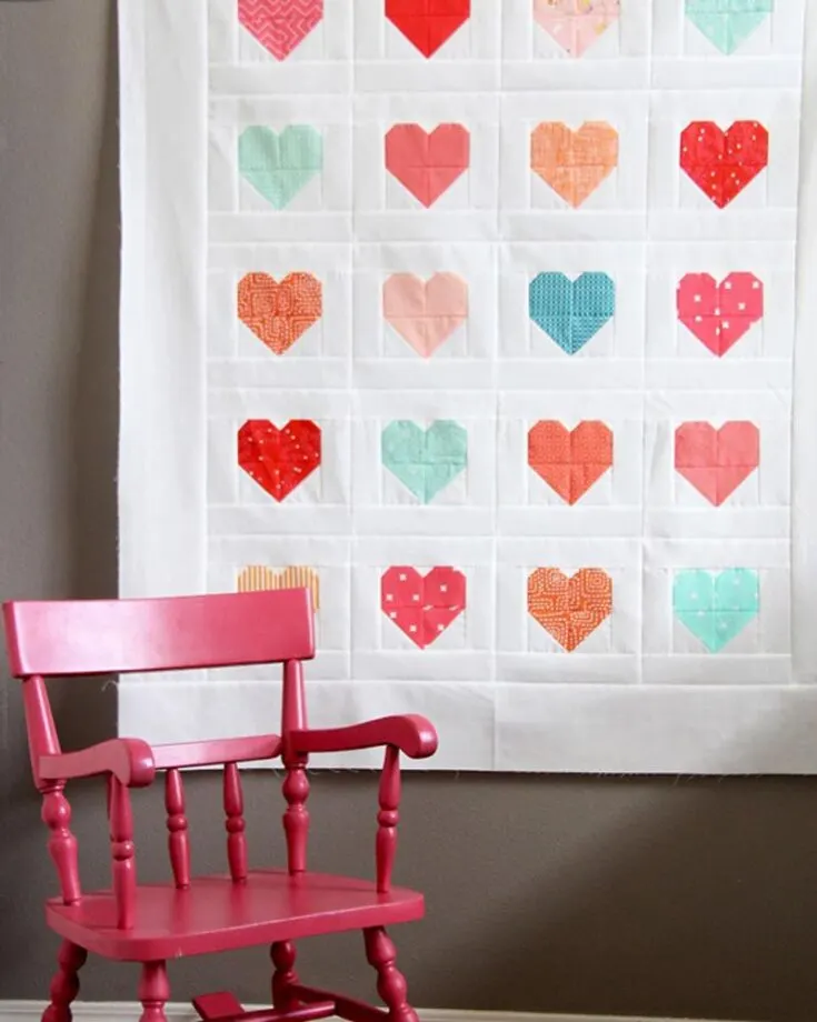 This stunning and adorable little heart baby quilt pattern is so simple to quilt. In fact, you can add in little swirls and bound in bright red that will piece together the design to make it even more unique! All you need to do now is to click the link below and follow the tutorial. The finished size is 36&rdquo; x 43&rdquo;.