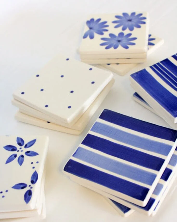 Create these stylish DIY coasters with patterned tiles by adding felt squares underneath for a table-friendly touch! This simple yet satisfying project allows you to repurpose spare materials while expressing your creativity.