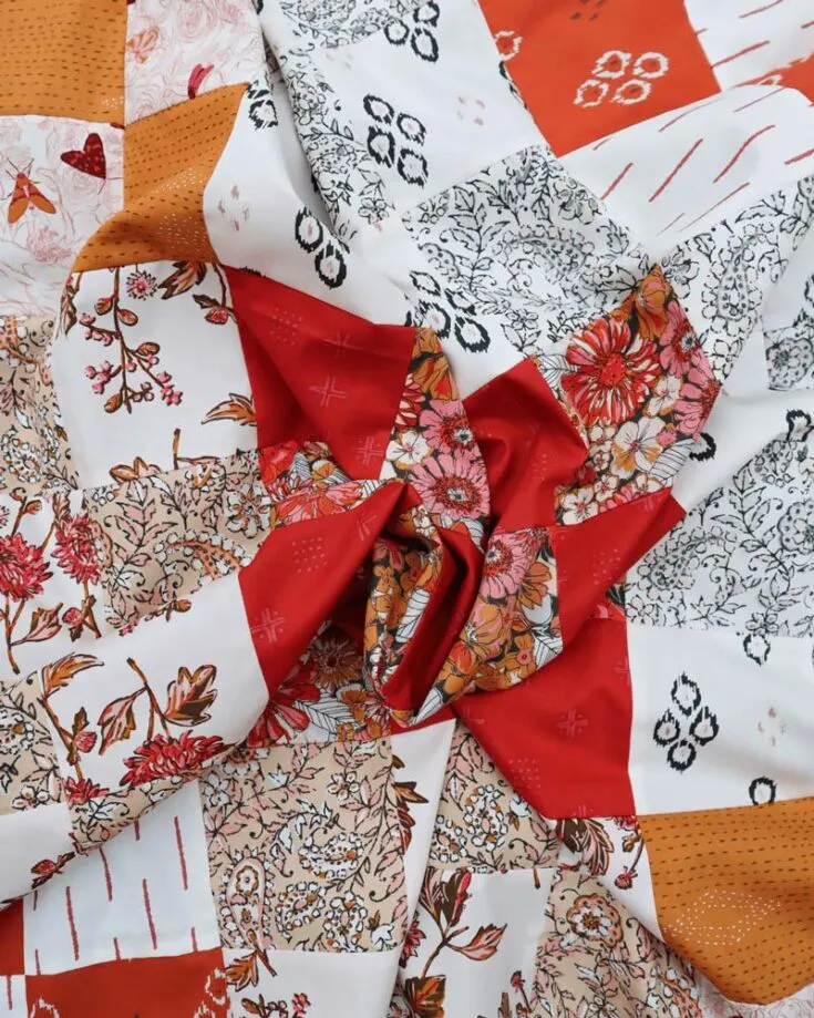Learn how to quilt this simple yet stunning pattern that takes the classic sixteen-patch quilt block and elevates it to fit fat quarter pieces! It has large blocks that highlight the fabric perfectly, and the contrasting hues make the quilt stand out! It also has four sizes: baby, small throw, large throw, and bed.
