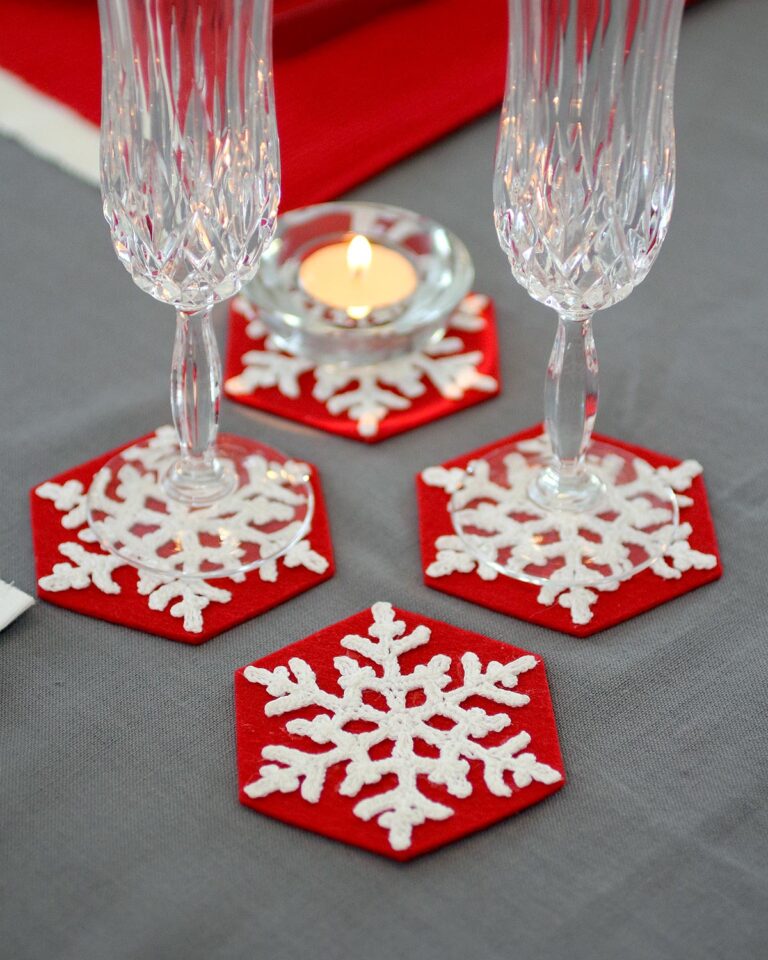 these snowflakes crochet coasters are perfect for holiday vibes. Crochet them with the free crochet pattern.