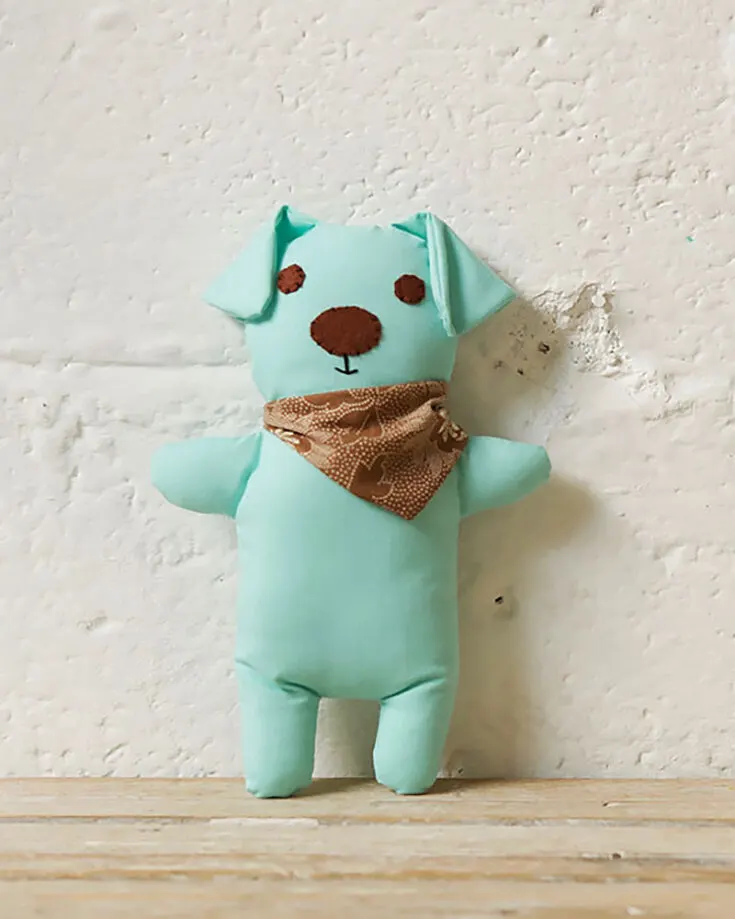 Looking for an adorable companion your little ones can snuggle with at night? Try making this snuggle puppy! It's a simple project that you can finish quickly, and who can resist those floppy ears and stylish bandana?