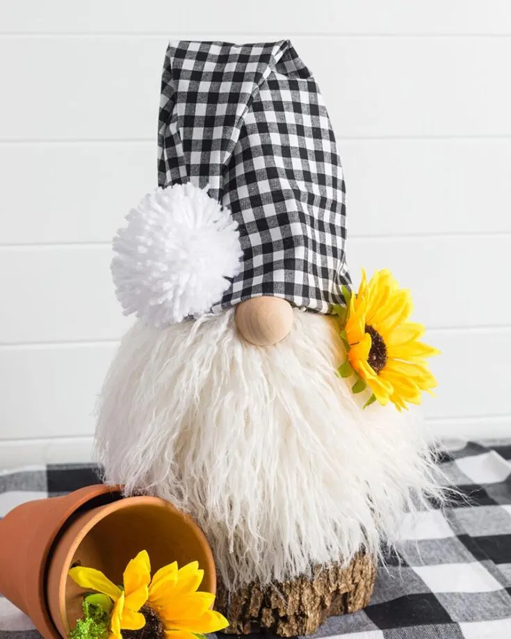 Want to add a touch of whimsy to your home decor or just love gnomes? Try making a bunch of these sock gnomes! They do require some extra materials besides socks for the body, like faux fur or yarn for its beard and a wooden ball for its nose. However, the result is worth it!