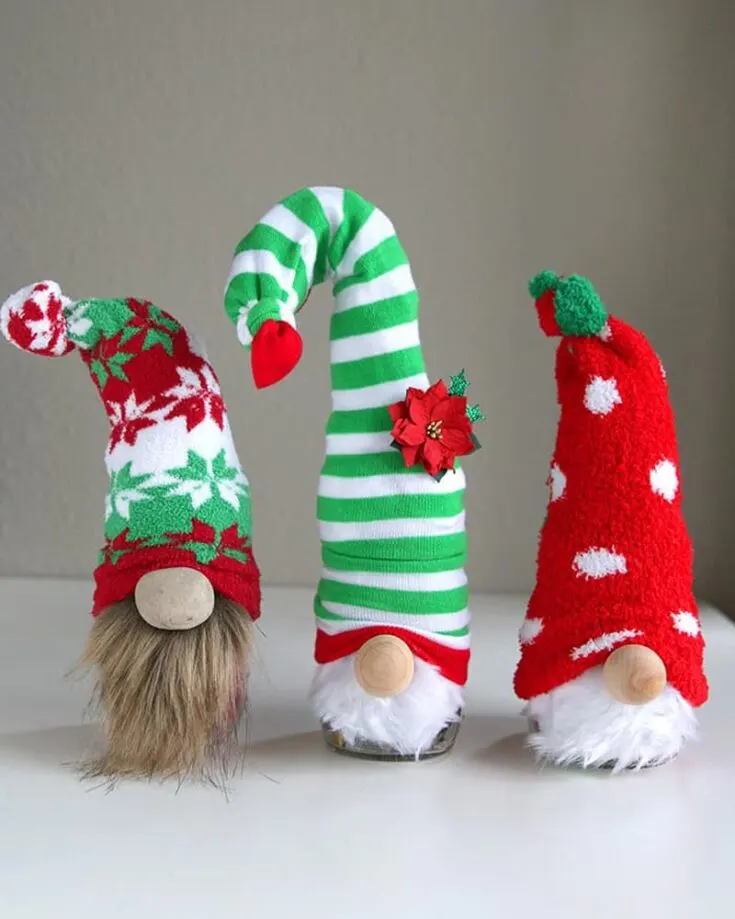 Make adorable sock gnomes using fuzzy socks from the dollar store! Fill a jar with candy for a sweet surprise that&rsquo;s sure to delight everyone, making them a fun and charming gift for house guests!