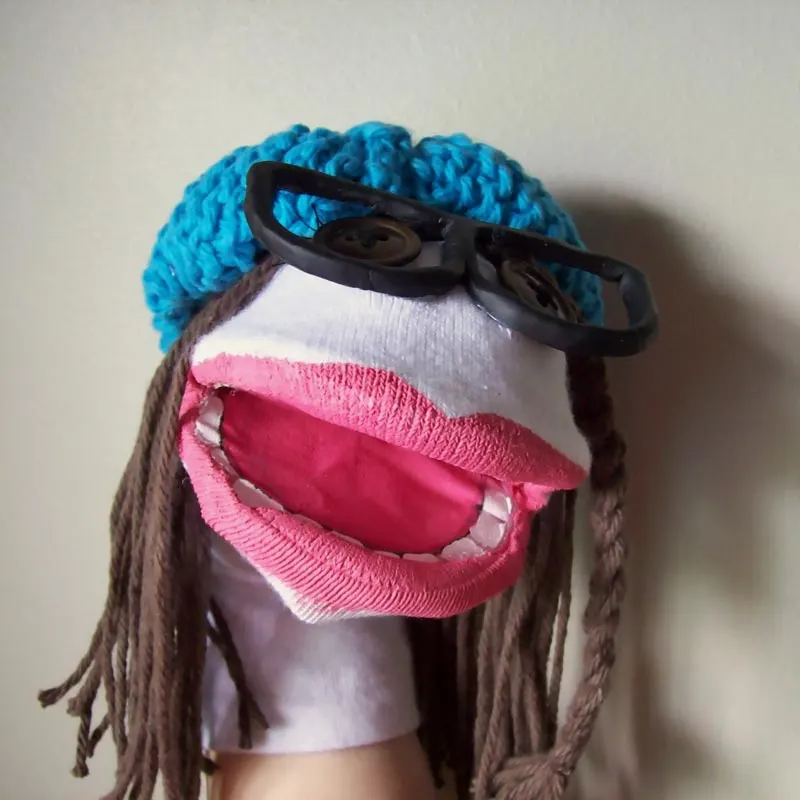 If you're looking for a fun birthday present to gift your sister, you should definitely try making this adorable sock puppet! The best part about this craft is that you can customize the puppet's accessories and color to fit your sister's attire. How cute is that?