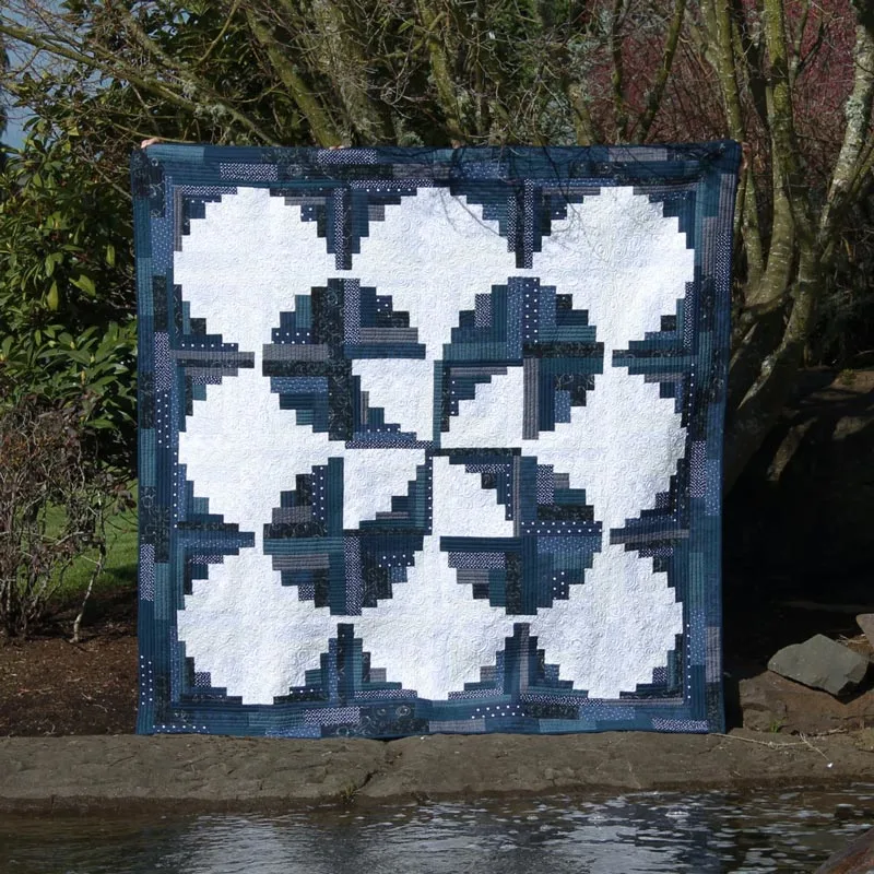 For only $11.35, quilt yourself this glorious and intricate piece that will leave your friends awestruck! This striking pattern is fit for advanced beginners and experienced quilters. It&rsquo;s a fantastic piece that combines the classic log cabin look with a modern twist. The finished size is 74&rdquo; x 74&rdquo;.