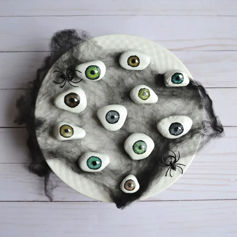 Serve up some scary fun with these Tray of Eyeballs! Click the link below to make gooey, icky eyeballs that work as a great Halloween decor. This craft is a great way to reuse and recycle by using pebbles you can find in your backyard!