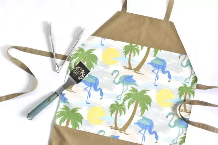 Here we have a men's apron for cooking and grilling patties at a lively cookout with the whole family! If you're familiar with sewing techniques and their various components, we believe this one is for you!