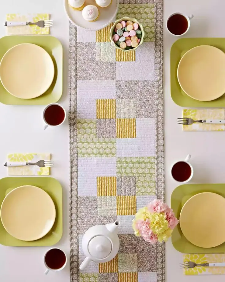 Starting off the list of table runner ideas is this gorgeous Square Scramble table runner and coordinating placemats combo! So, if you're looking for a matching set right off the bat, this pattern is what you're looking for.&nbsp; Table runner size: 14 &frac12;&rdquo; x 50 &frac12;&rdquo;&nbsp; Place mat size: 14 &frac12;&rdquo; x 19 &frac12;&rdquo;