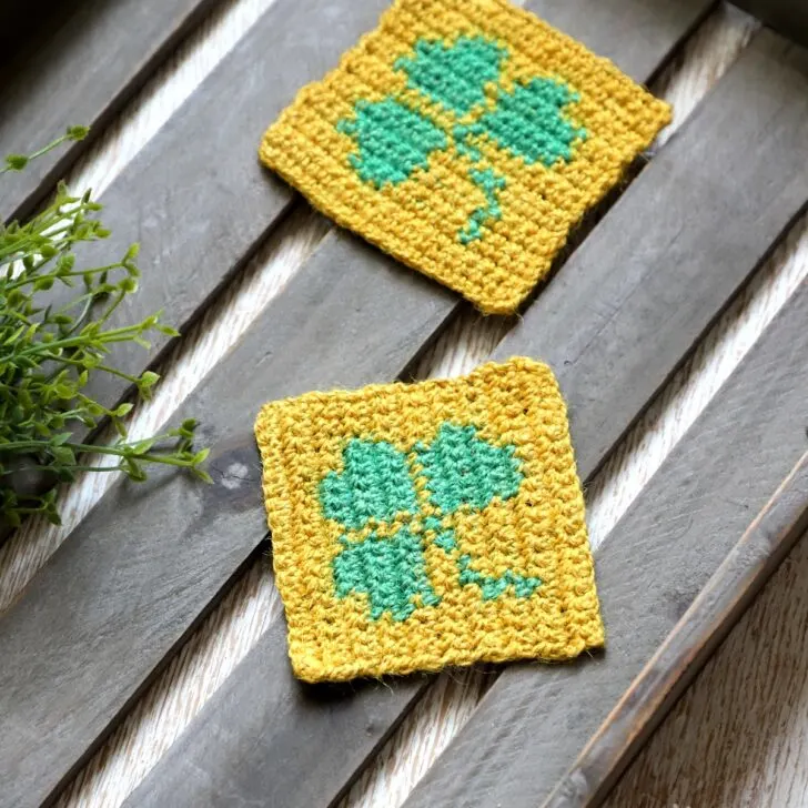 Free crochet shamrock coaster pattern! Quick, easy project that's perfect for St. Patrick's Day decor. Join multiple for a bigger project!