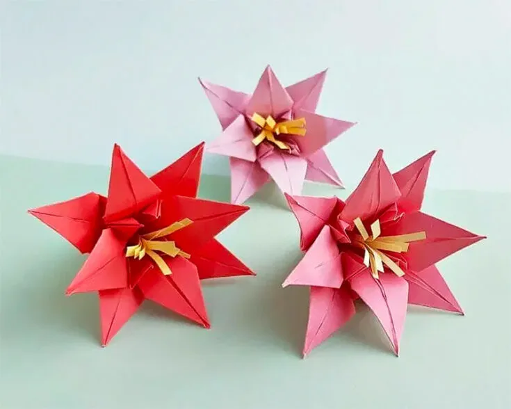 After mastering all the different versions of Origami Lily and Iris, you can create a more sophisticated origami Lily by stacking 2 flowers together and adding a stamen. This origami tutorial comes with a how-to DIY video.