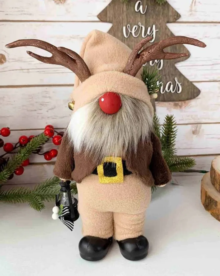 Meet the adorable standing reindeer gnome, complete with charming antlers and a cozy gnome jacket pattern! It features cute gnome pants and a slouchy hat, making it a delightful addition to your holiday decor.