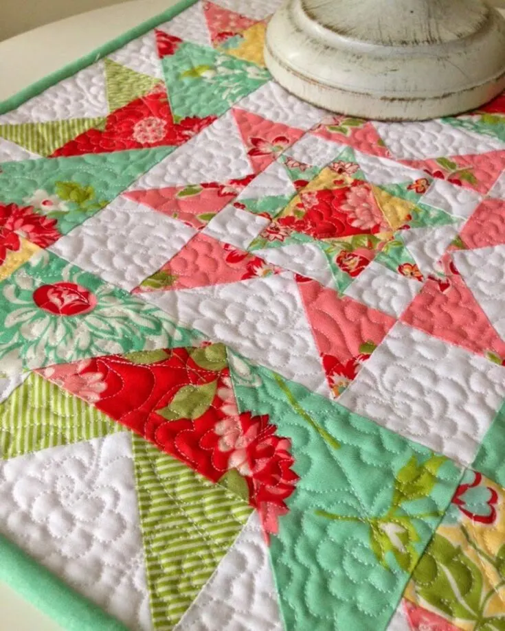 Check out this mini quilt that uses 16&rdquo; star blocks that combine the Crown of Thrones and Crystal Star blocks, which results in this beautiful Star Cluster Mini Quilt. It&rsquo;s super versatile, which makes it easy to be upsized into a large quilt. Whether you prefer to have it as a wall hanging, table topper, or cushion, the choice is yours. Just follow along with the tutorial.