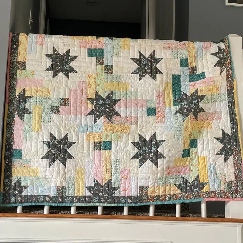 Create this stunning two-color sawtooth star quilt block with a scrappy strip quilt for only $8.00. It&rsquo;s an intermediate-level quilting project that offers an assortment of stars and finishes at 60&rdquo; x 60&rdquo;, making it an excellent blanket for daily use.