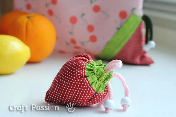 How to sew a grocery bag pattern with a strawberry drawstring bag attachment. Fold & store the bag inside the drawstring bag when not in use.