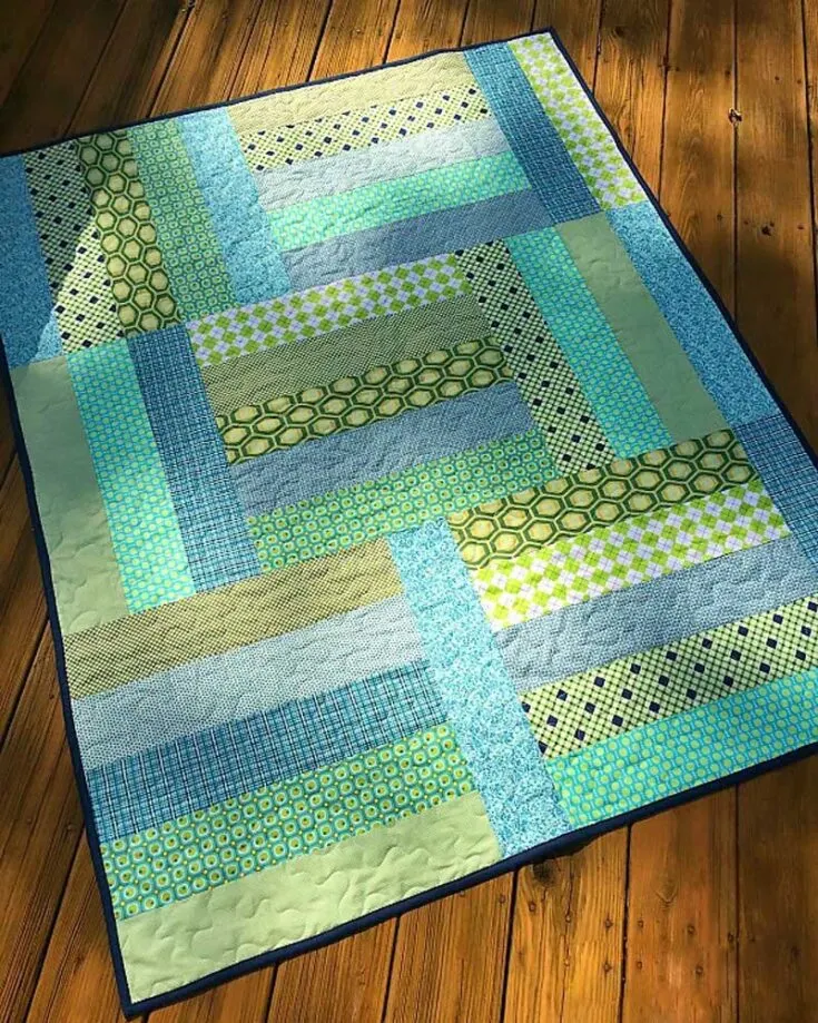 Don&rsquo;t you just love how stunning and calming this Strip Tango baby quilt looks under the sun? This pattern will guide you into making a quilt that combines soft earth-toned fabric strips in a playful dance of hues and is very easy to put together. It&rsquo;s a fat quarter-friendly piece; the finished size is 48&rdquo; x 60&rdquo;.
