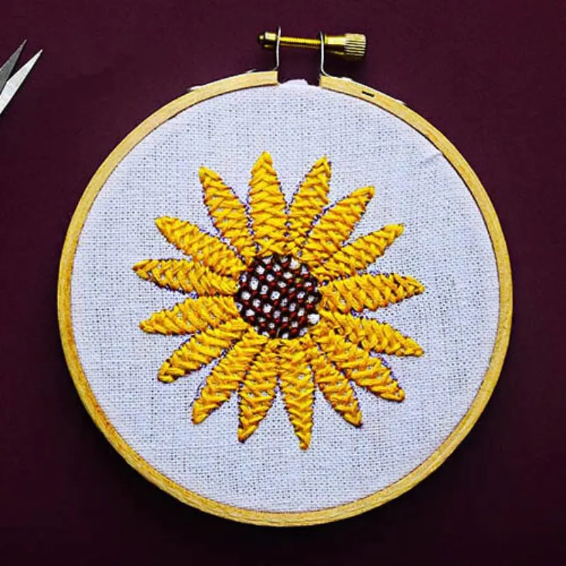 Try out this step-by-step tutorial to create this lovely closed herringbone stitch sunflower design on a warm sunny day. Although this pattern might look daunting initially, it merely repeats three types of stitching.&nbsp;