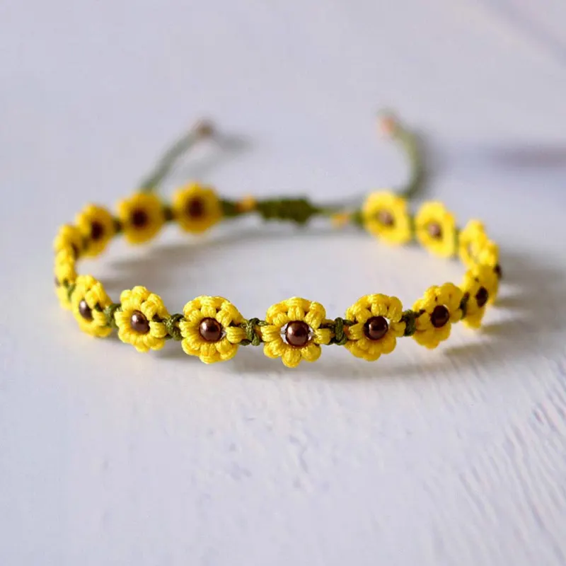 Bask in the glory of spring with these cheerful sunflower macrame bracelets! They're a beautiful accessory to showcase along with your outfits, and the best part is that you can customize the colors of the sunflower to your preferred color scheme!