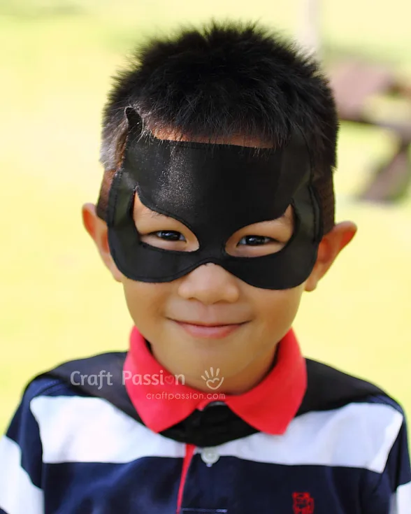 sew a matching batman mask to complete the batman cap costume