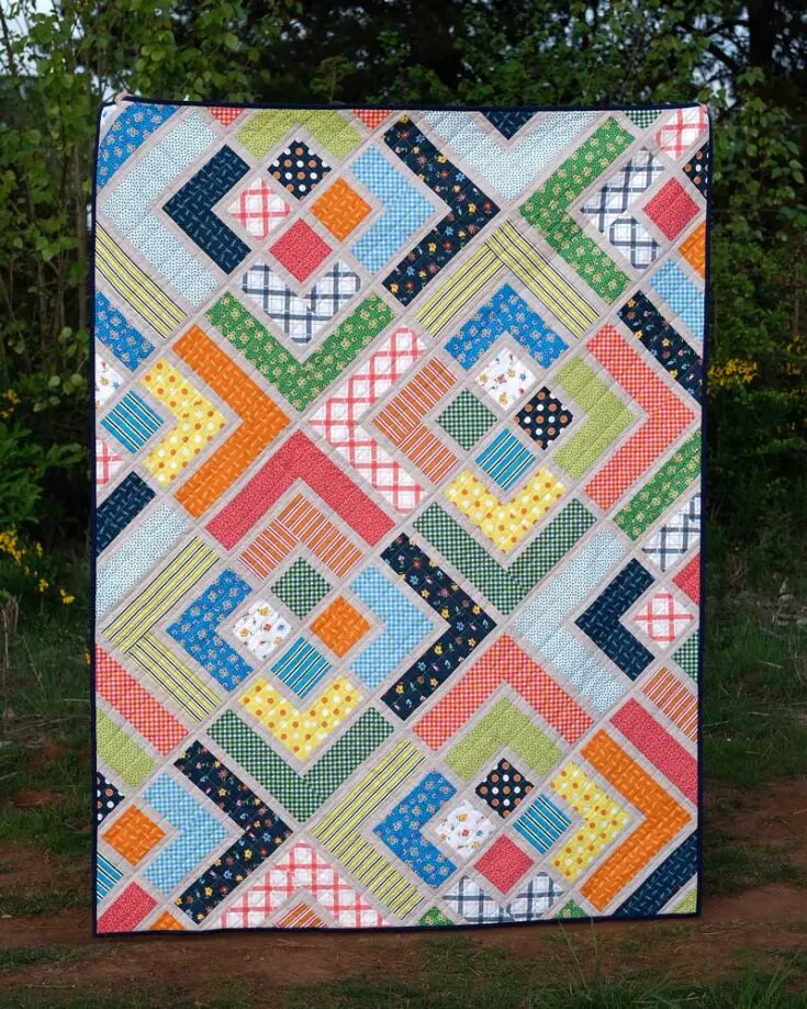 The Penny Quilt is an inexpensive pattern on Etsy that every quilter must have on their to-quilt list. Have a look at this beauty! It's riddled with geometrical shapes, and it helps to put those large scraps into good use by revamping them into this lovely quilt. It's an intermediate pattern that offers three sizes.&nbsp;