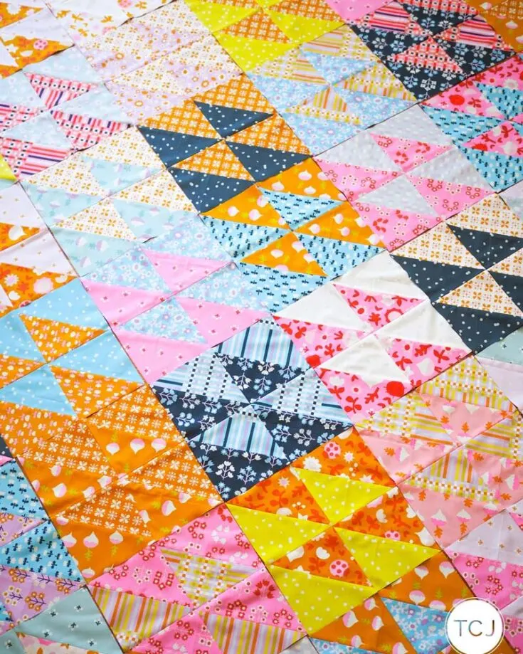Don&rsquo;t you just love how colorful and vibrant this sugar quilt is? Immerse yourself in soft hues and simple geometric shapes to create a sweet design perfect for beginners and seasoned pros. This large throw-size quilt pattern has half-square triangles (HSTs) and matching background fabric. However, you can opt for no background fabric to give it a scrappy look. The finished size of this quilt is 63&rdquo; x 72&rdquo;.