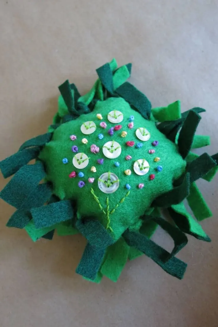 This is another no sew option that is simple and still looks great. It features a tutorial on how to make an embroidered a flower bouquet as well, but if you want to decorate your no sew pincushions a different way that is also entirely up to you!