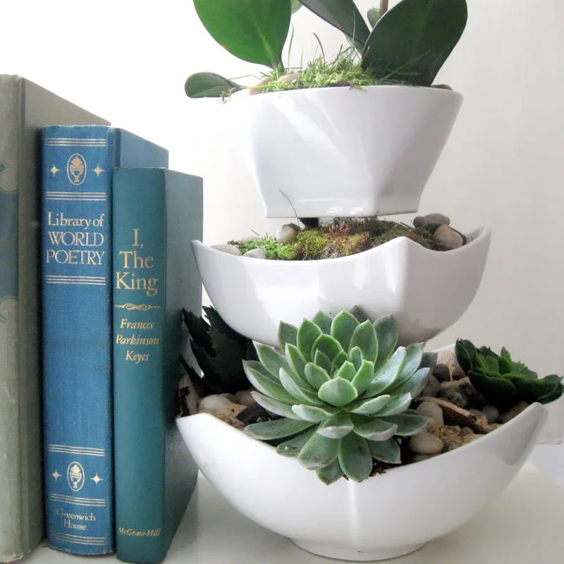 Another West Elm inspired craft! Add a touch of fresh greenery with this tiered succulent planter. Customize the planter with your favorite succulents and greenery to create an eye-catching display. Whether placed on a patio or in a sunny corner of your home, this tiered planter is sure to become a great conversation starter.