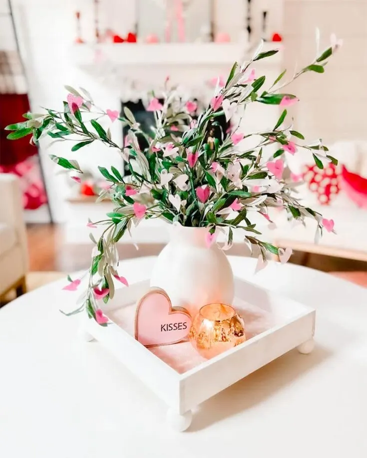 Make this simple tissue paper Valentine's tree by cutting hearts in various shapes on colored tissues and placing them on branches. And there you'll have it -- a special centerpiece for your house!