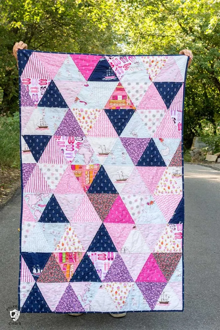 Now, if you'd like to exhibit your luscious stash of printed fabrics, this Simple Triangle Quilt would do the trick. You could make this 46" x 72" quilt with a stack of Fat quarters too!