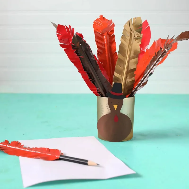 Meet your new pen pals with these feather-topped pens! It is a simple craft that will make you smile as you jot down notes. It adds a beautiful touch to your pens, making your journalling so much more fun and colorful.
