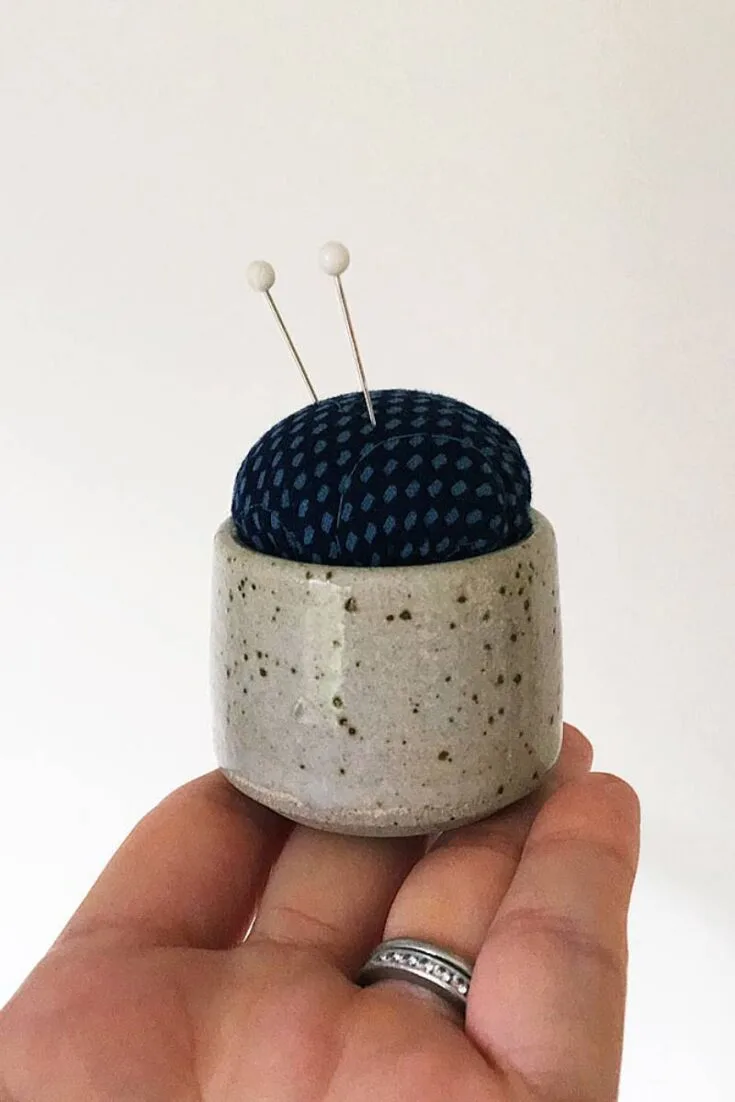 Upcycle any small ceramic cup from the thrift store with this simple tutorial. Using just a few simple stitches and some polyfilament stuffing, just sew the cushion up and glue it in the cup! A great tutorial for anyone that's not so confident in their sewing skills.