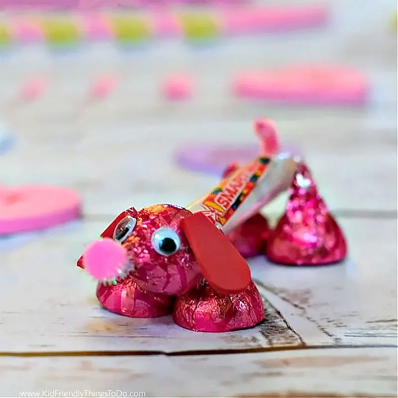 This is one of those fun Valentines Day crafts for preschoolers and kids of all ages. Inspire them to make their own candy dog with different pink/red candies.